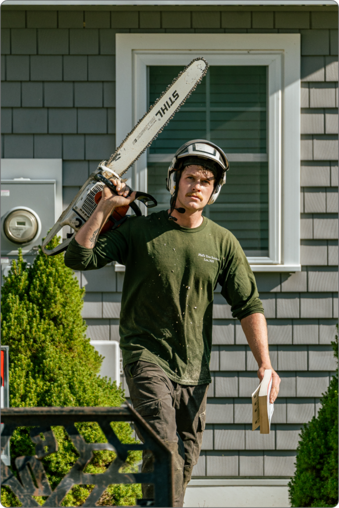 Man holding chainsaw